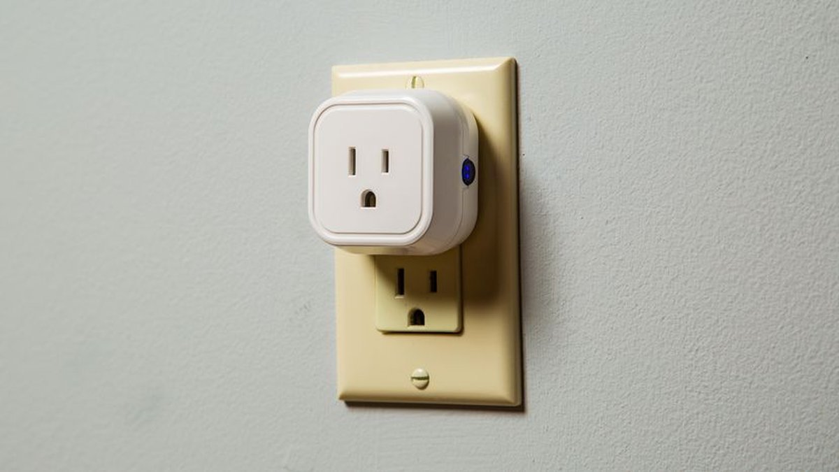 best smart plugs 2026 plugged into wall outlet with lamp