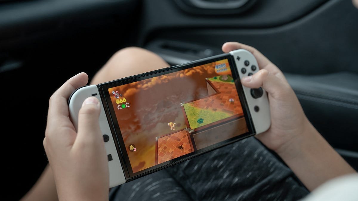Playing a handheld gaming PC while traveling 2026