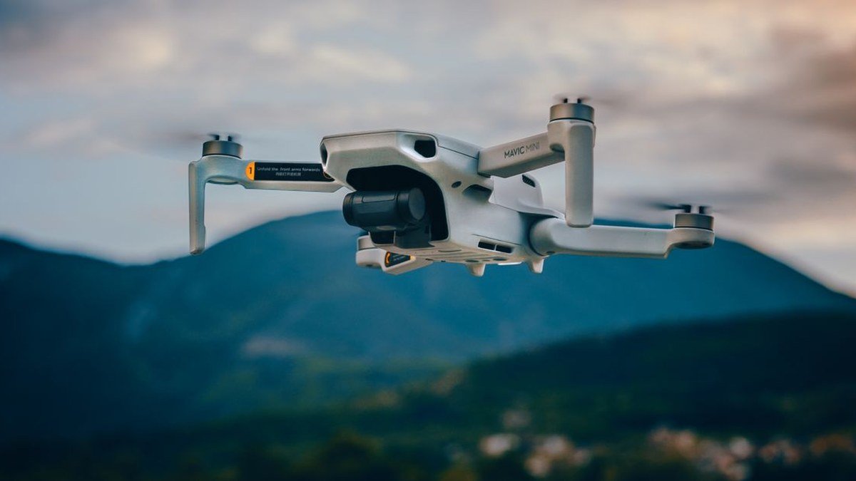 DJI Mavic drone flying long range over landscape — best long range drones 2026