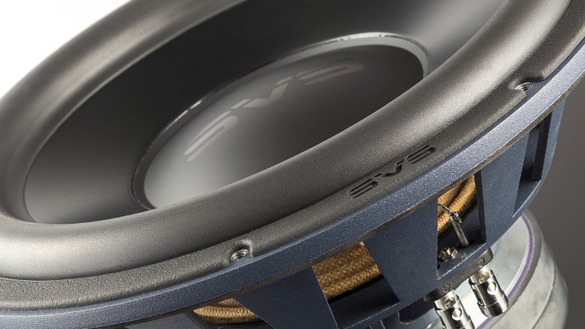 Close-up of a subwoofer driver cone, best subwoofers for deep bass