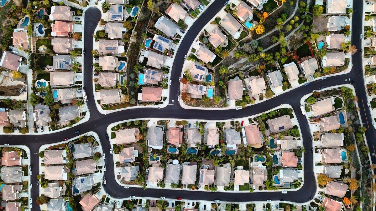 Suburban neighborhood aerial view from drone — best drones for real estate photography 2026