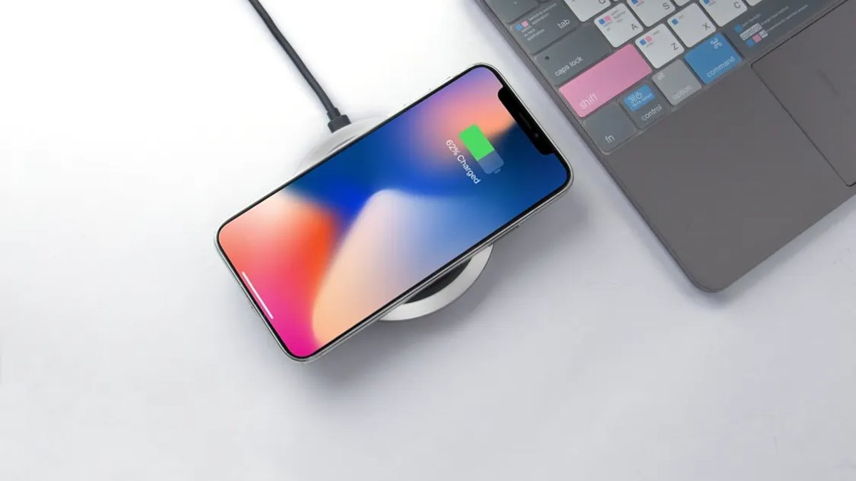 Smartphone on magnetic wireless charger close-up