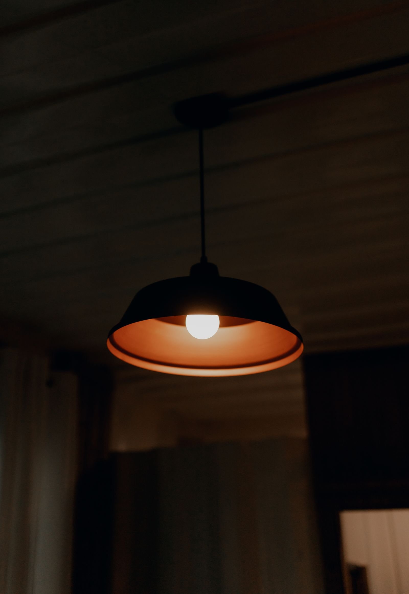 Smart Bulb Not Connecting? 7 Fixes That Actually Work Glowing smart bulb in a lamp in a warm home — fixing a smart bulb not connecting