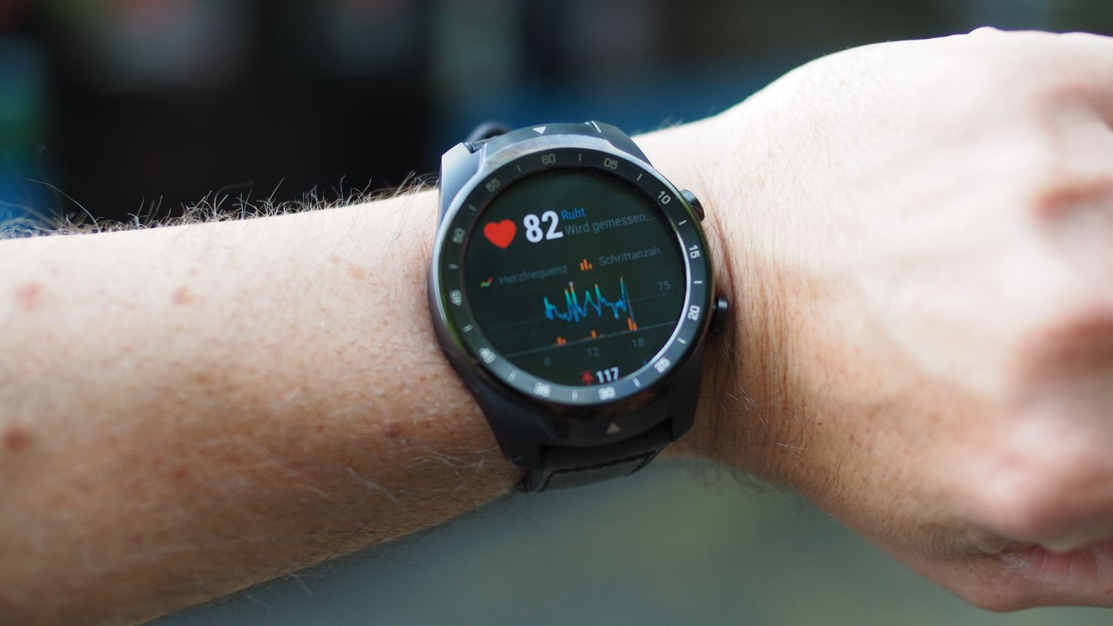 Smartwatch showing heart rate and fitness metrics close-up in smartwatch comparison