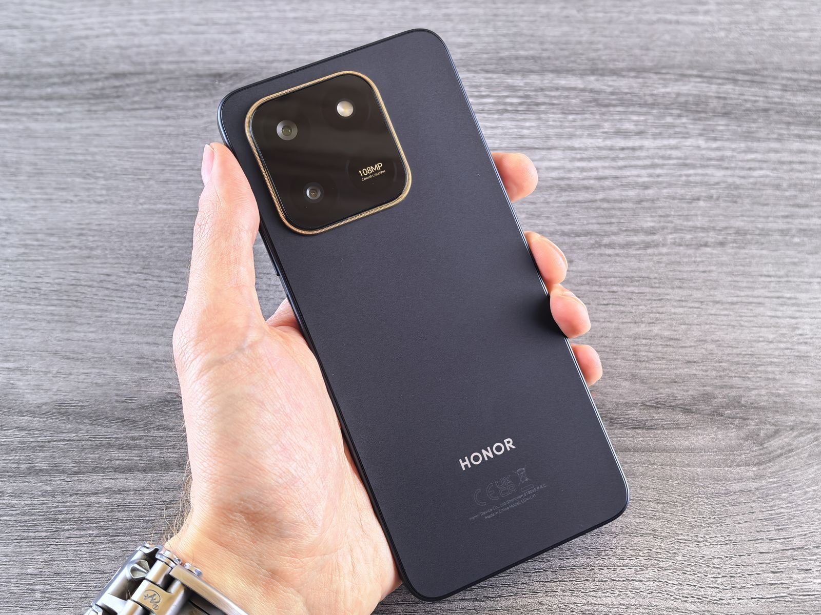 Close-up of a hand holding a modern smartphone